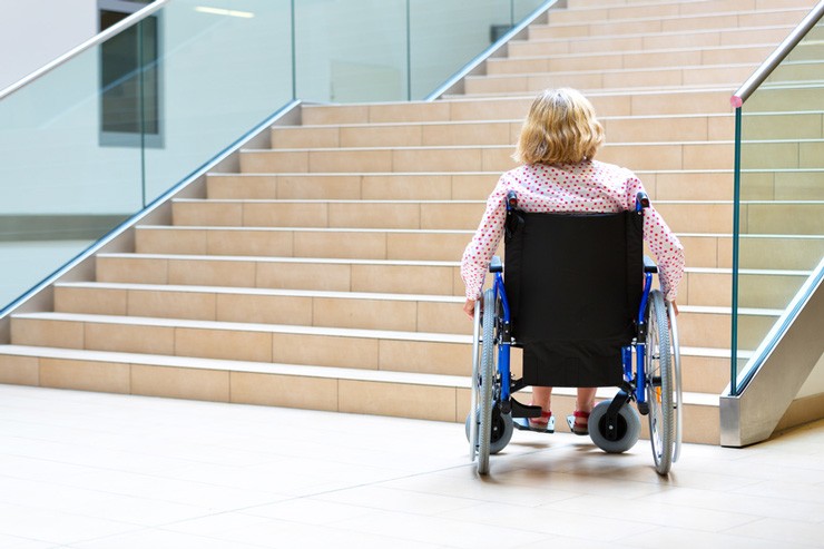 A person with reduced mobility using an accessible route mapped by ownMap